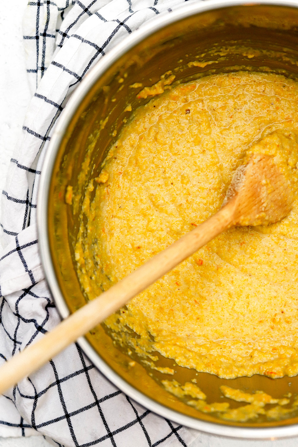 vegan and gluten free blood orange upside down cake batter in a mixing bowl