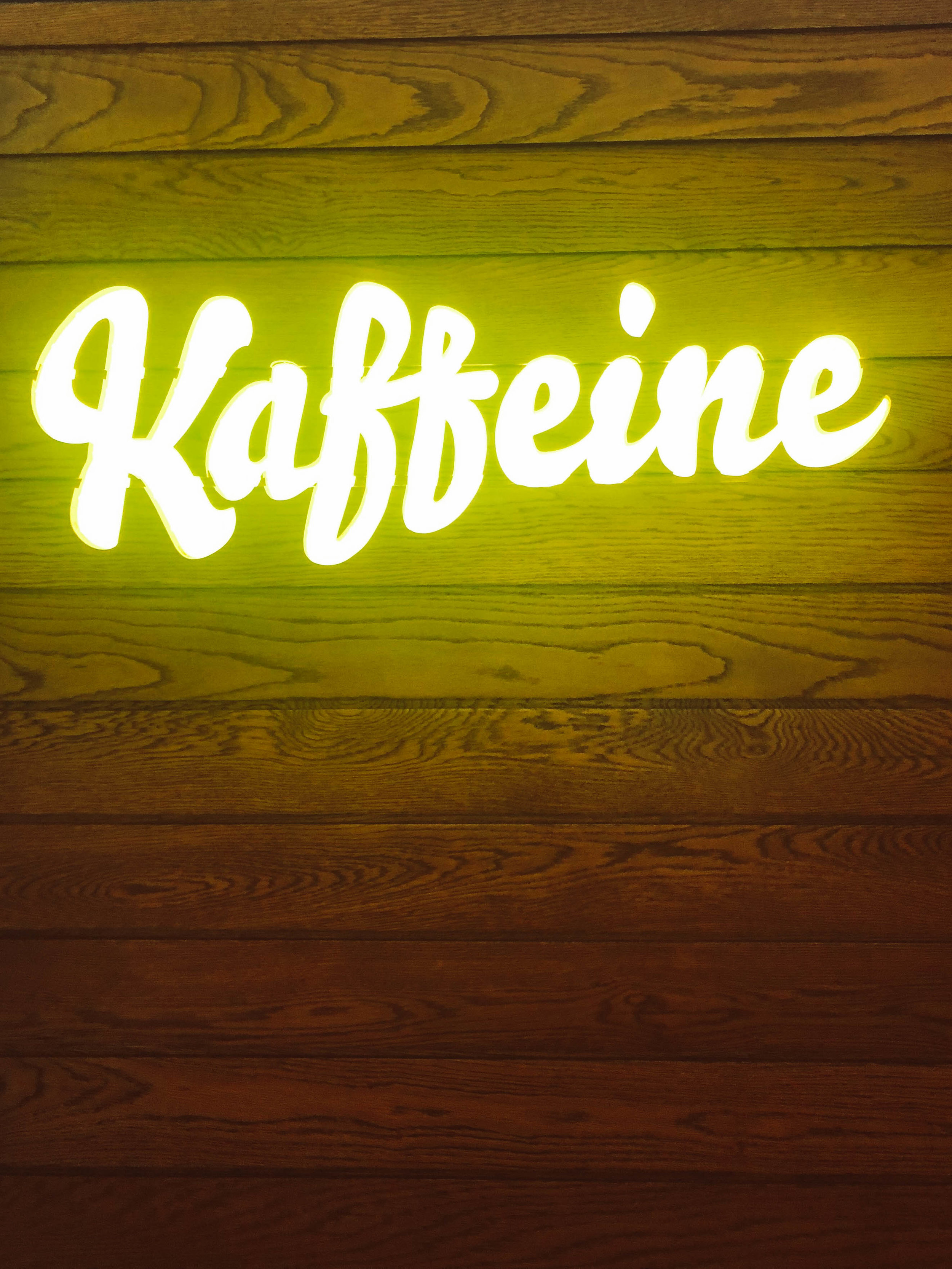neon sign at Kaffeine in London