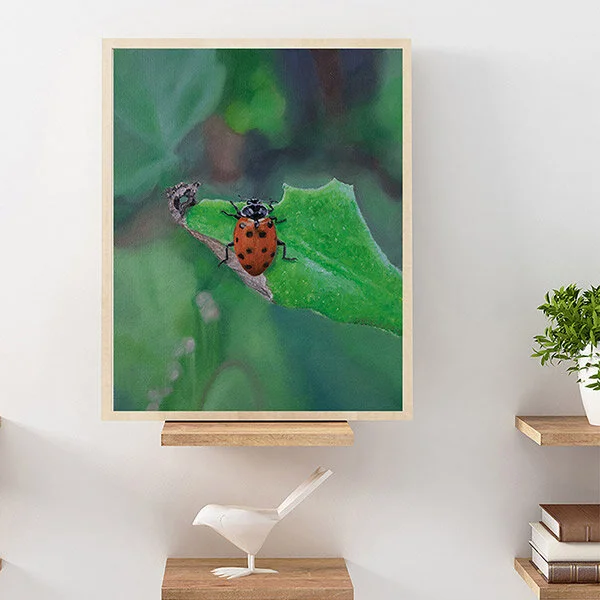 Oil painting - Lady on a Leaf hanging in a room.
