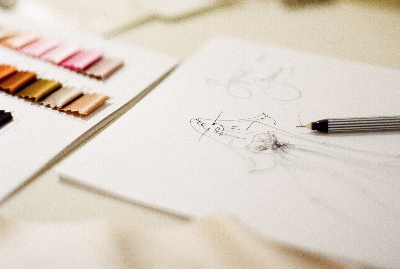 Satin fabric swatches and hand drawing by designer Britta Kjerkegaard at The COuture Gallery Kensongton, London