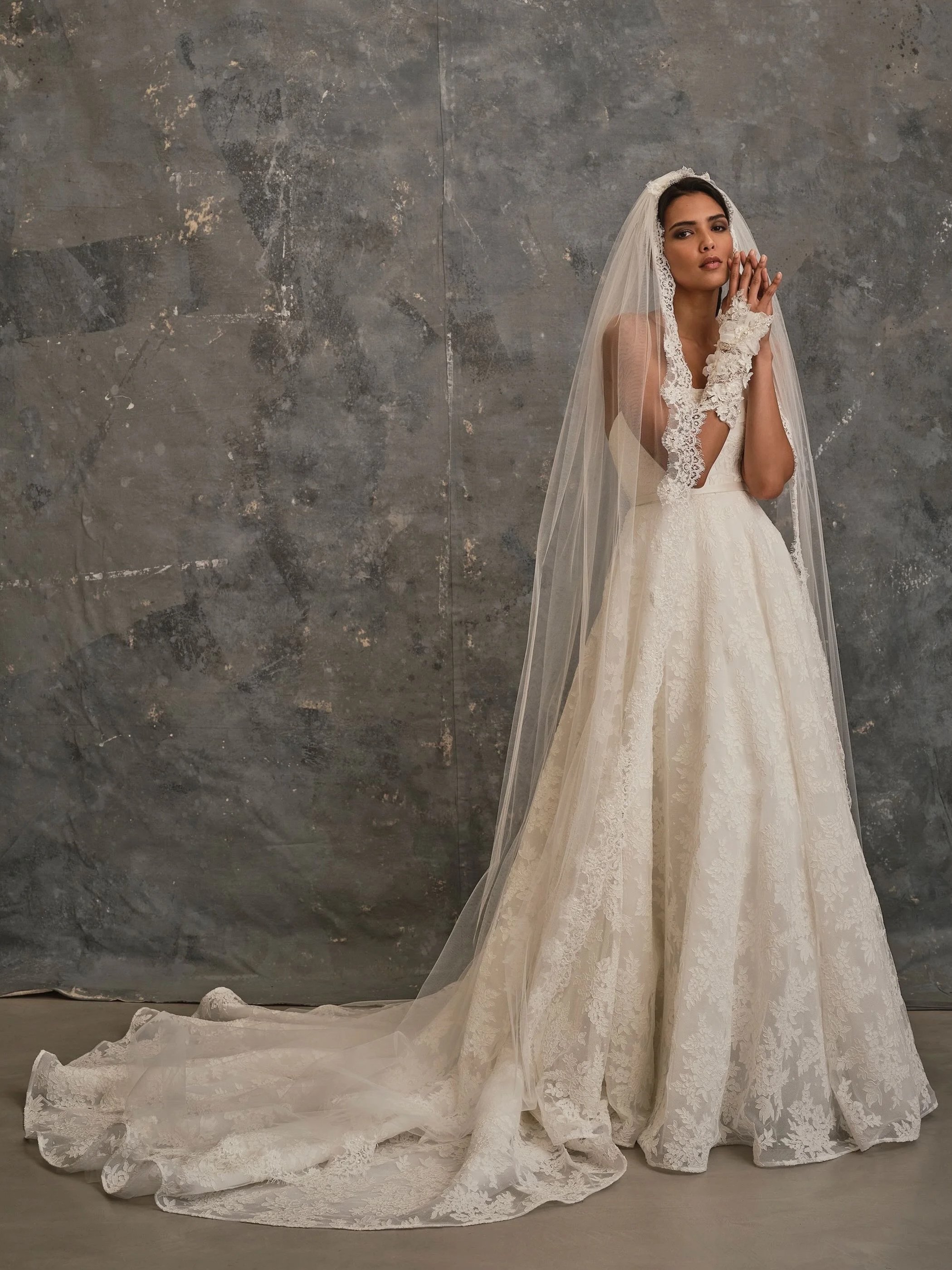 Cordelia romantic lace wedding dress with cathedral veil and floral lace detailing