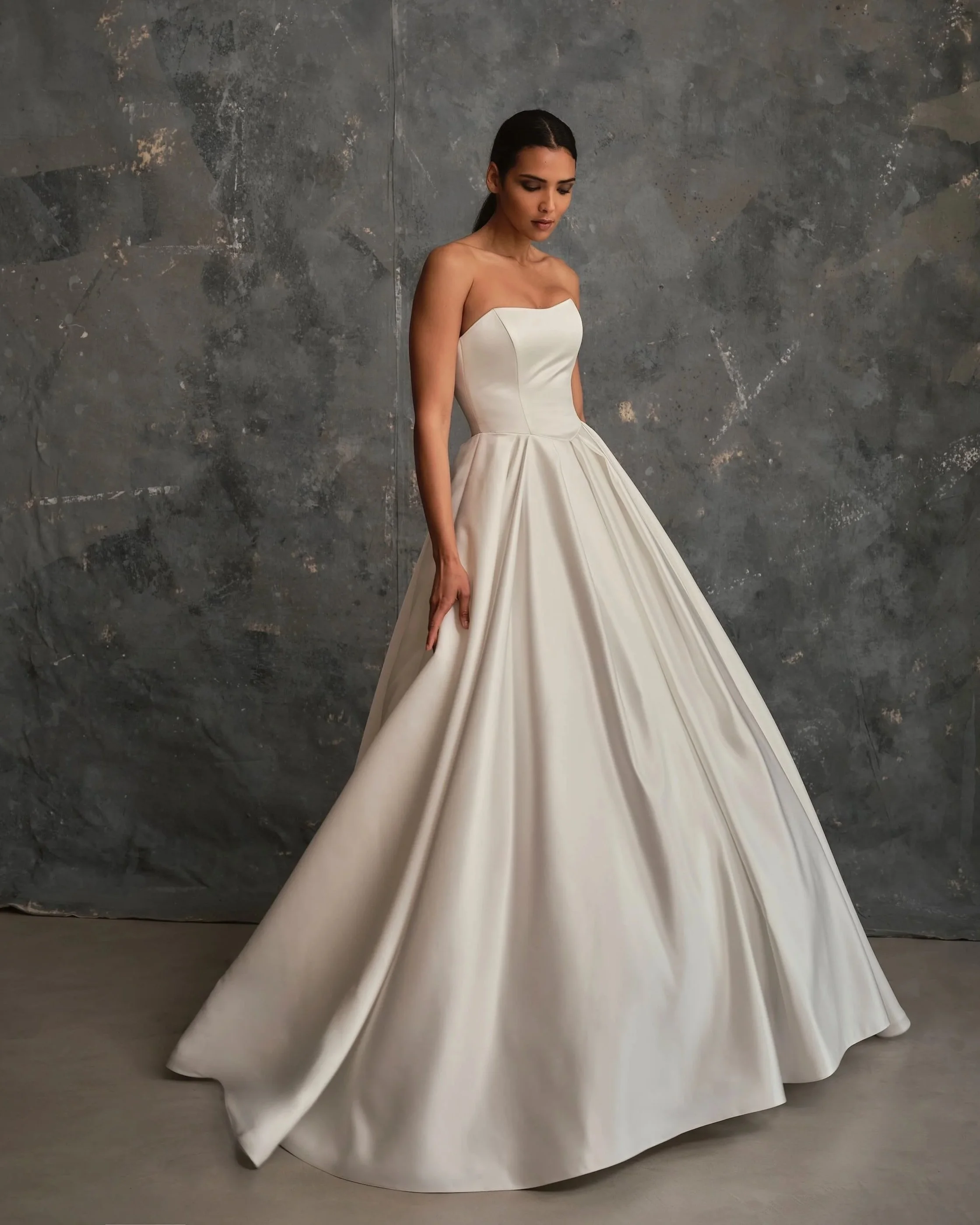 Celine minimalist satin ballgown wedding dress with strapless bodice and full skirt