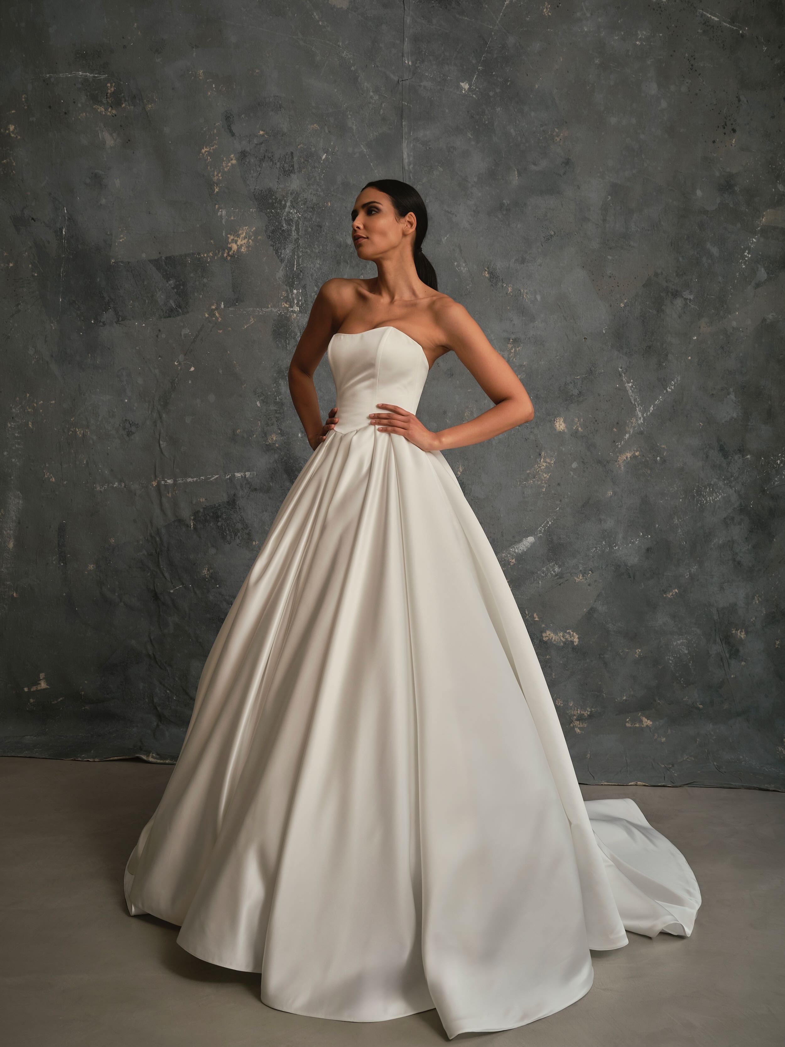 Classic strapless satin wedding dress with elegant full skirt