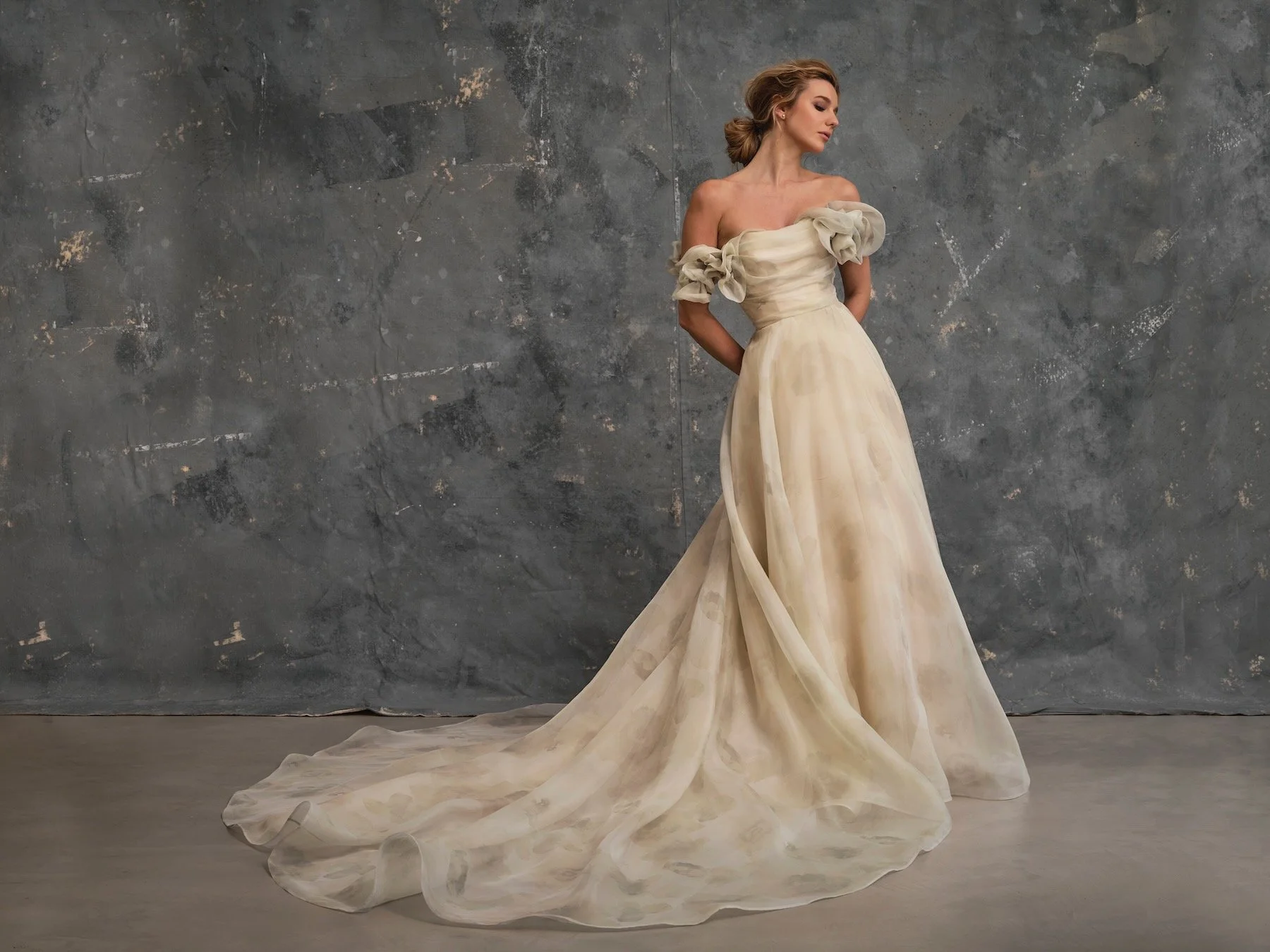 Blossom couture wedding dress featuring botanical floral organza and off-the-shoulder sleeves