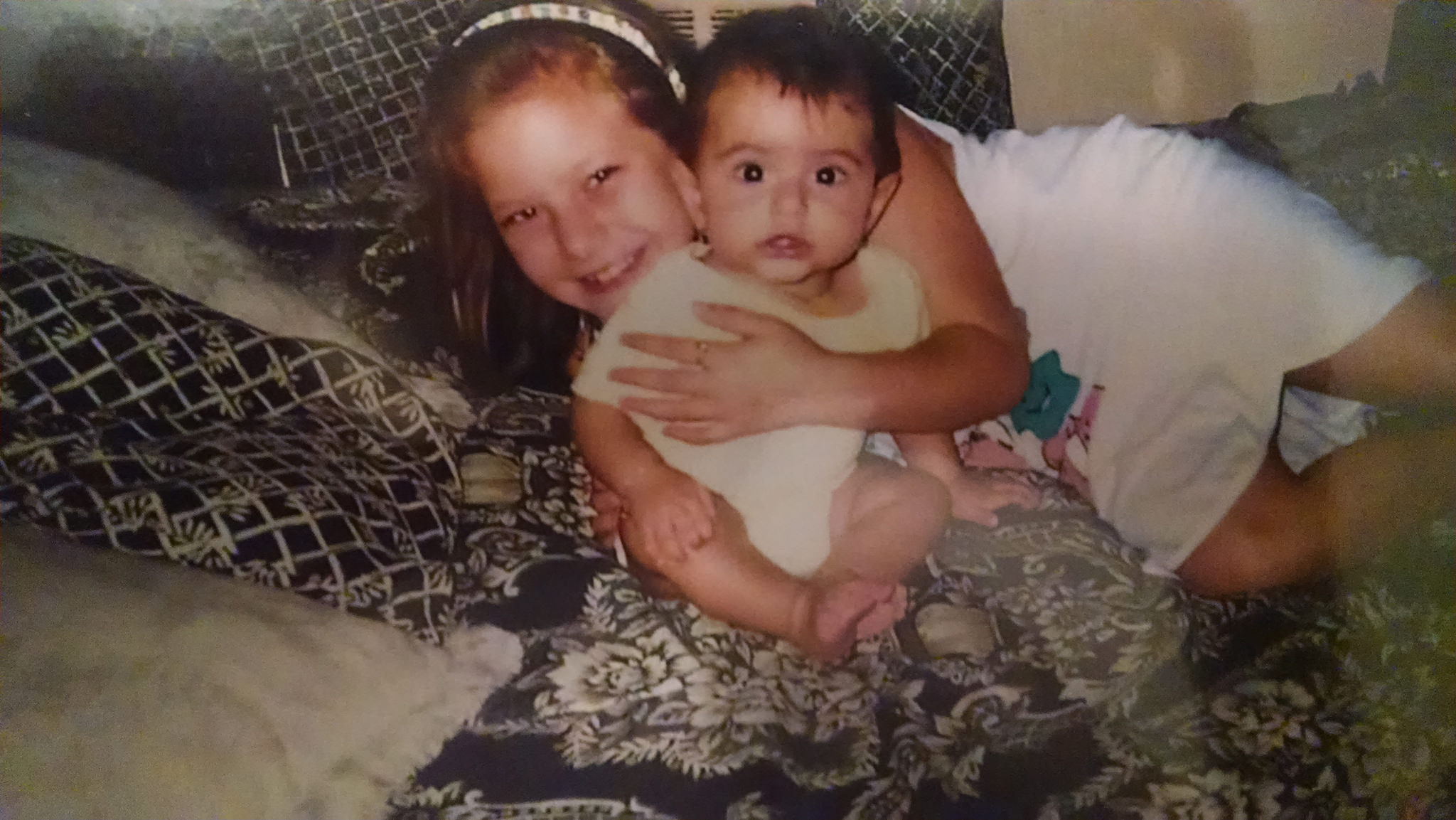 Here's a picture of a picture of me (7) and my beautiful sister (less than 1). 