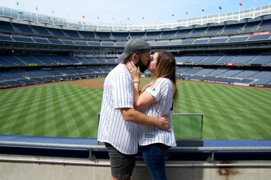 surprise proposal yankee stadium new york engagement photographer