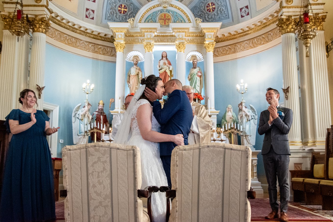  Traditional Catholic Polish American Wedding photography Connecticut Massachusetts  Divine Mercy Parish Massachusetts  first kiss as husband and wife 