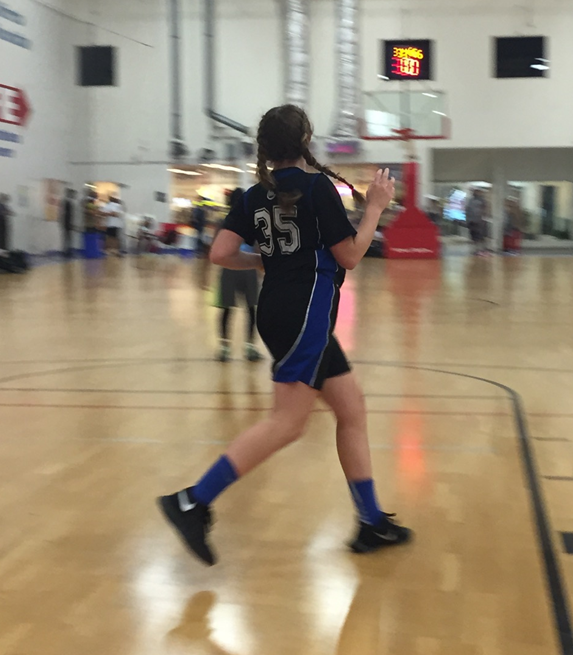 Rebecca Carpenter's daughter calling for the ball in the key.