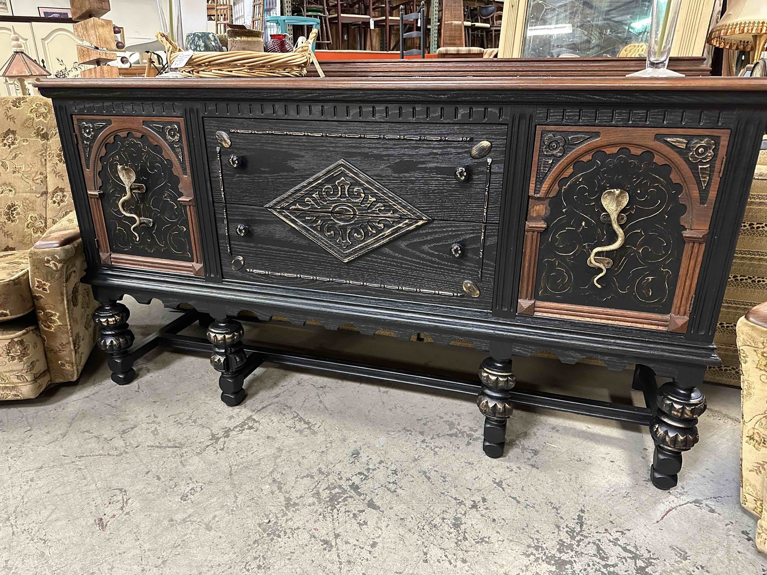 Black Carved Buffet with Snake Handles.jpg