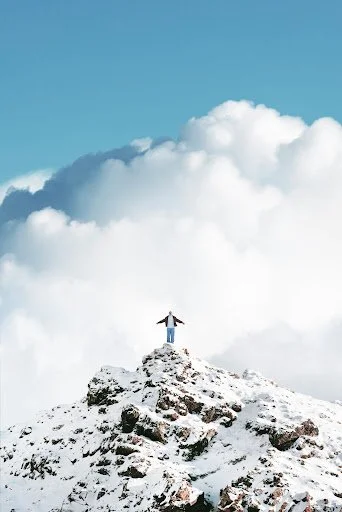 sumitting a mountain