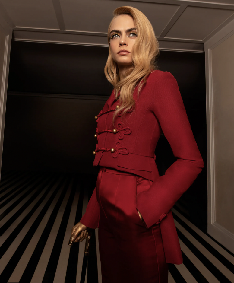 Vanity Fair | Inside Cara Delevingne's Golden Met Gala Look, Body Paint to Screen Star Hair 