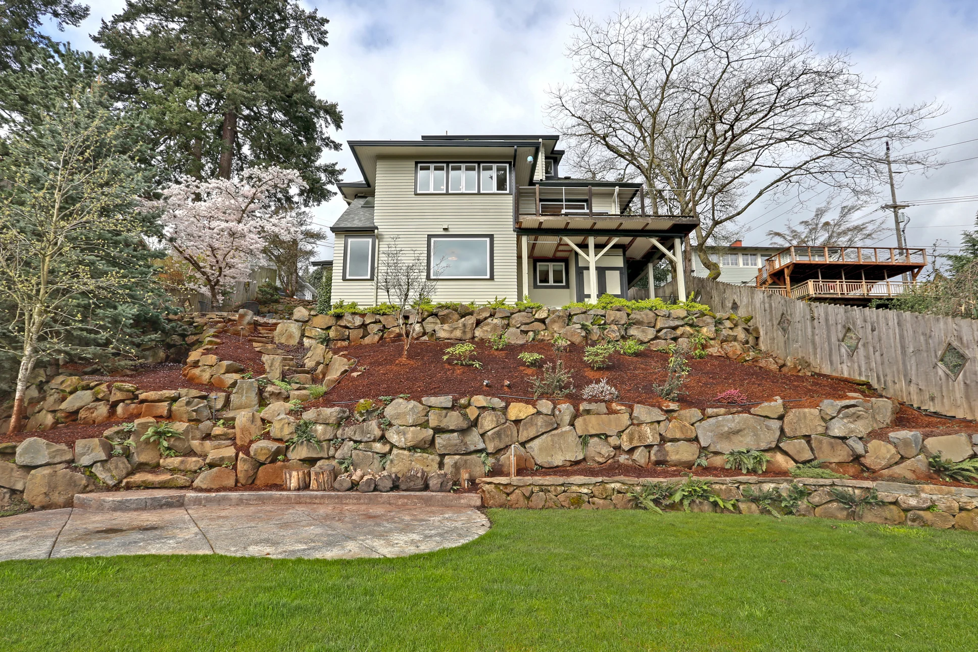The rear view of the home shows the proportionate addition that maximized the home's footprint, while remaining visually unobtrusive. 