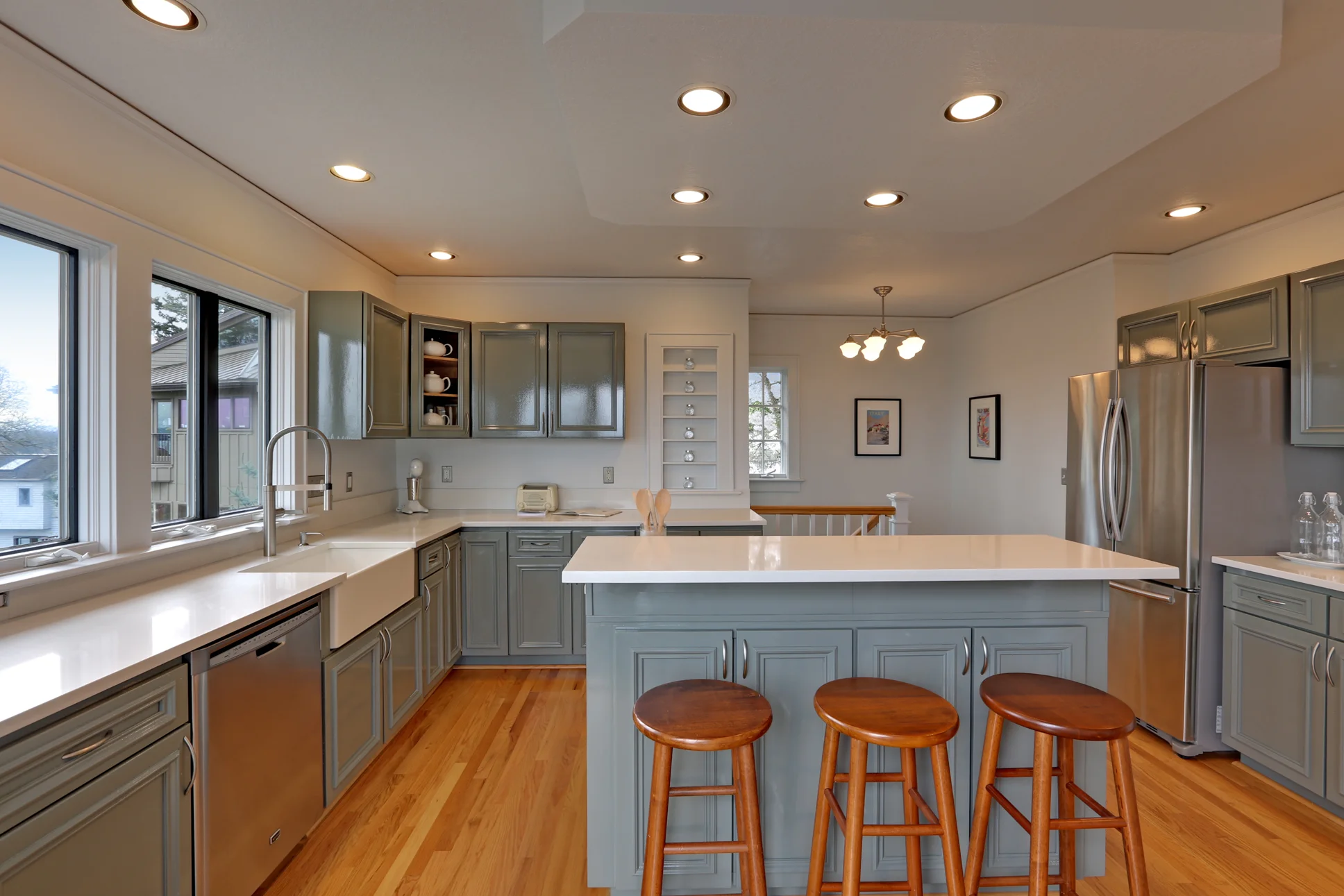 Reconfiguration of the home included a new staircase off of the kitchen that descends to the lower-level addition.