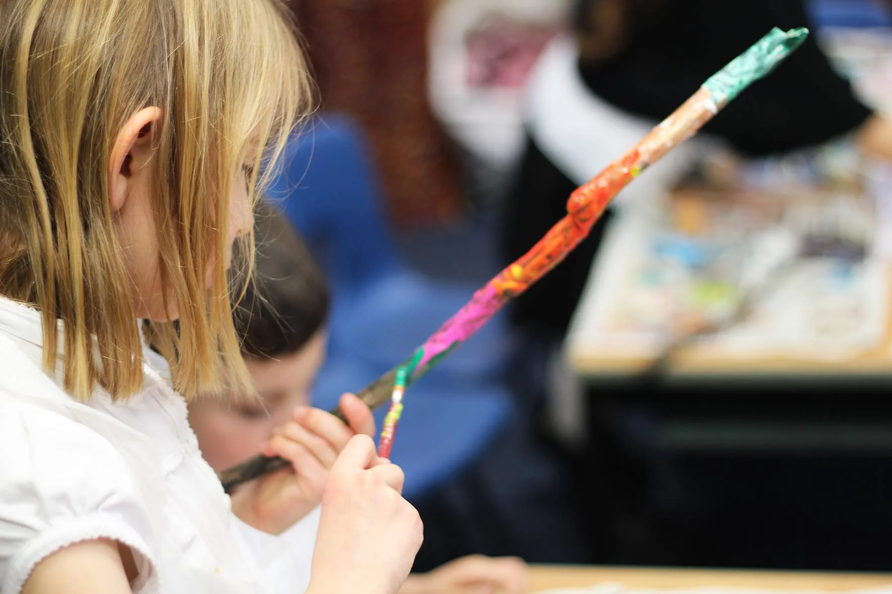 P3 Pupil at Abbeyhill Primary School in Edinburgh painting driftwood
