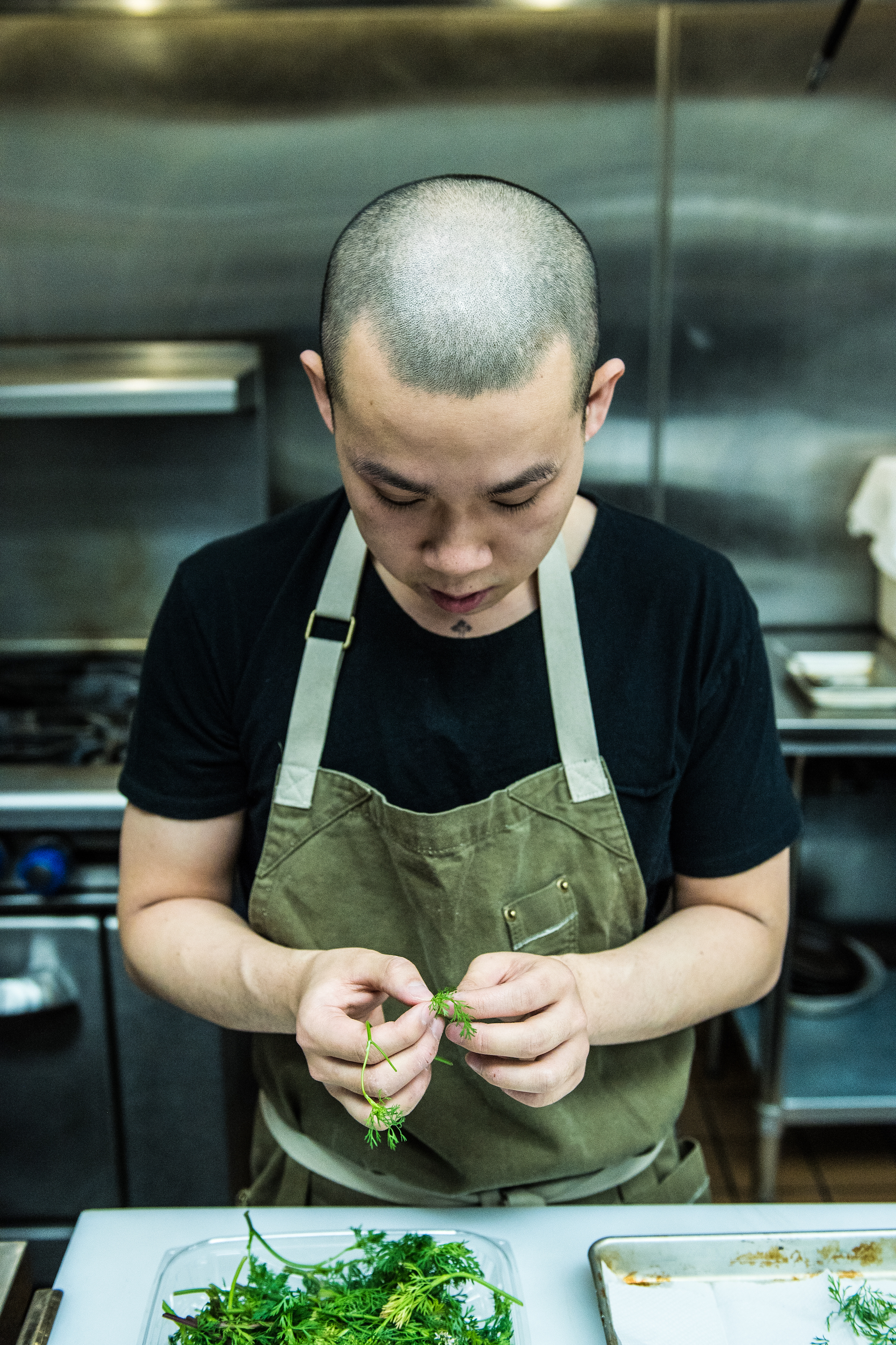Chef Yao working with some micro greens.