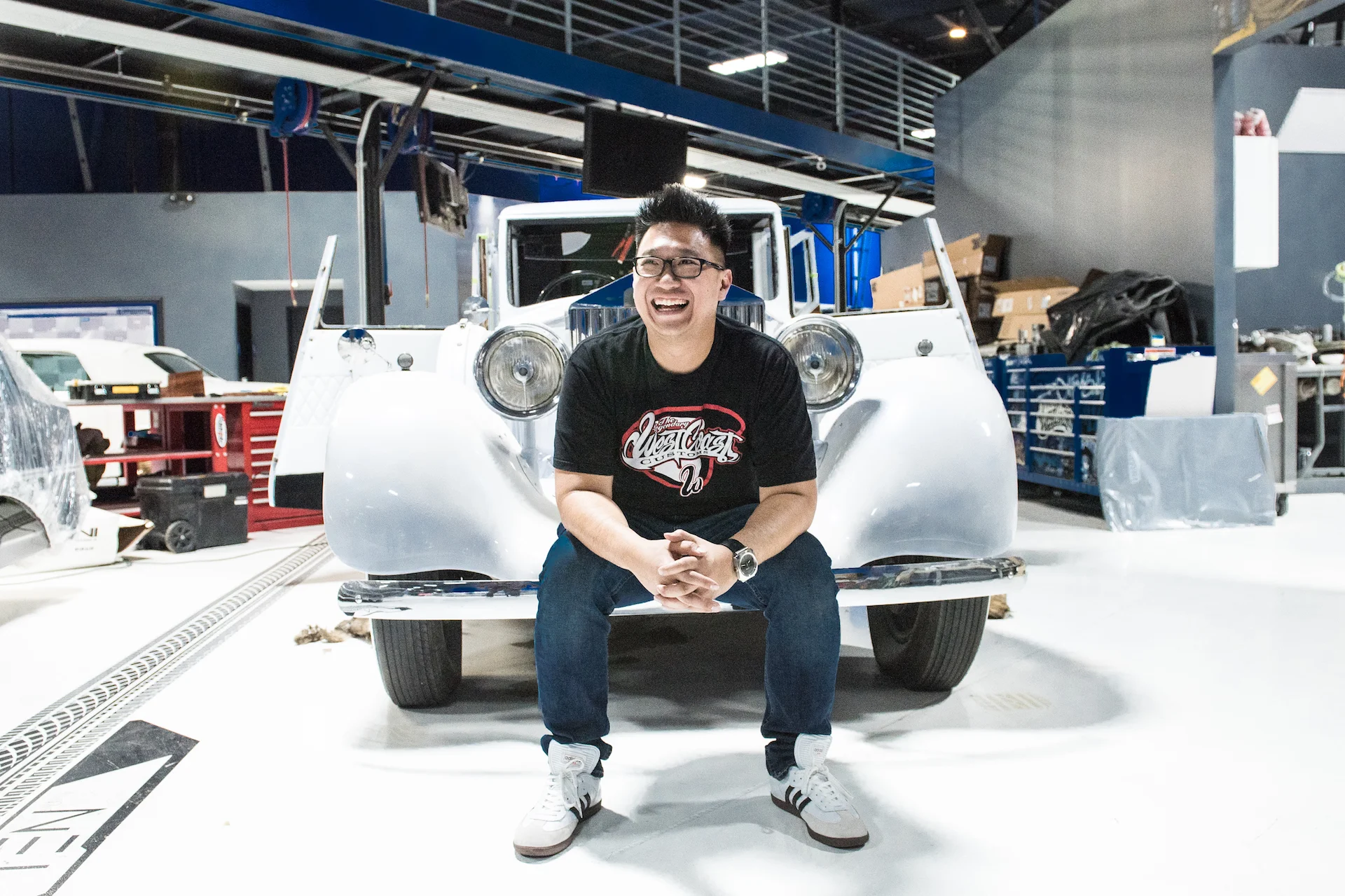 Musa Tjahjono, Head Designer at West Coast Customs, in front of Justin Bieber's Rolls Royce Phantom.