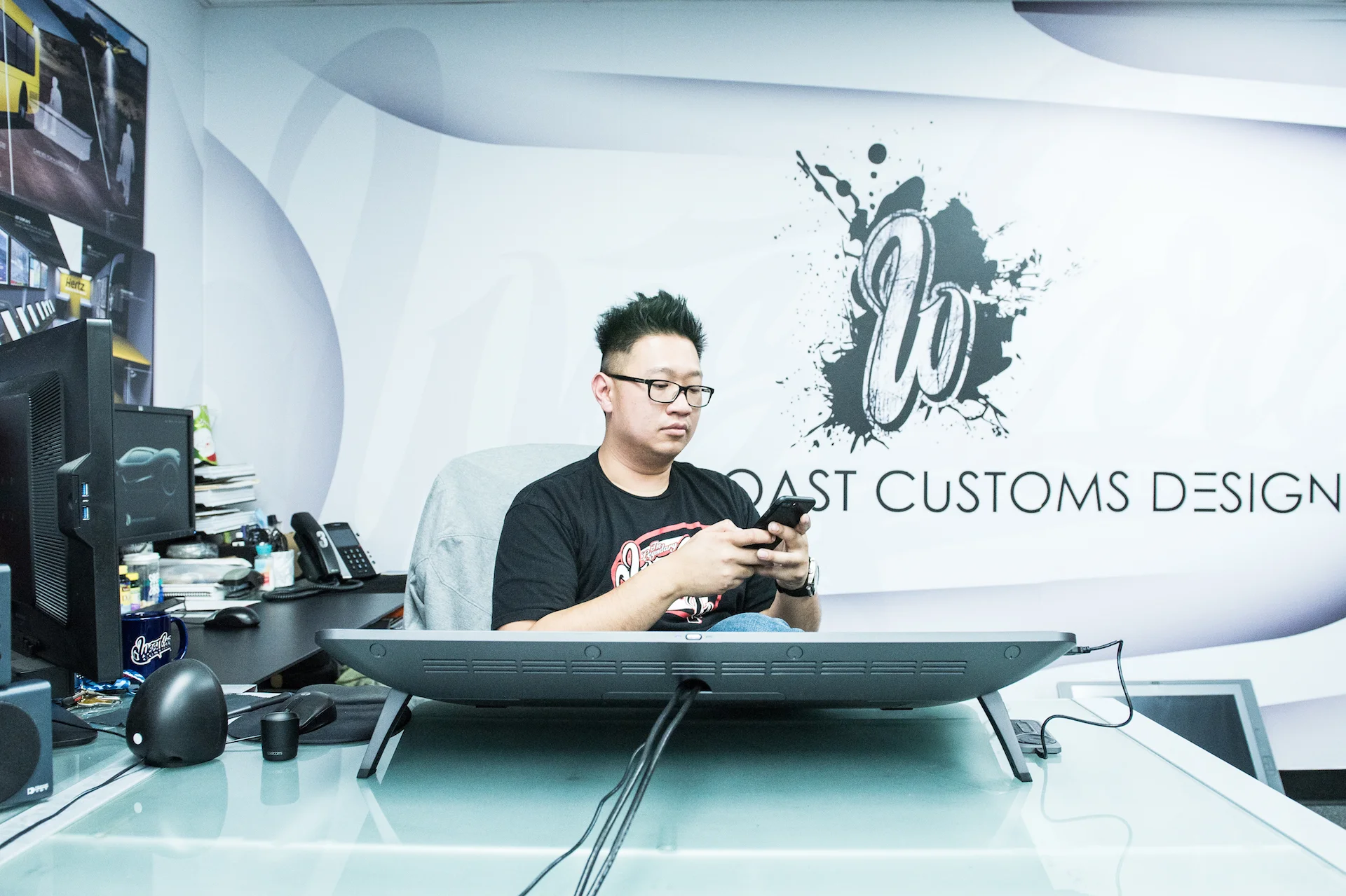 Musa in his office at West Coast Customs.
