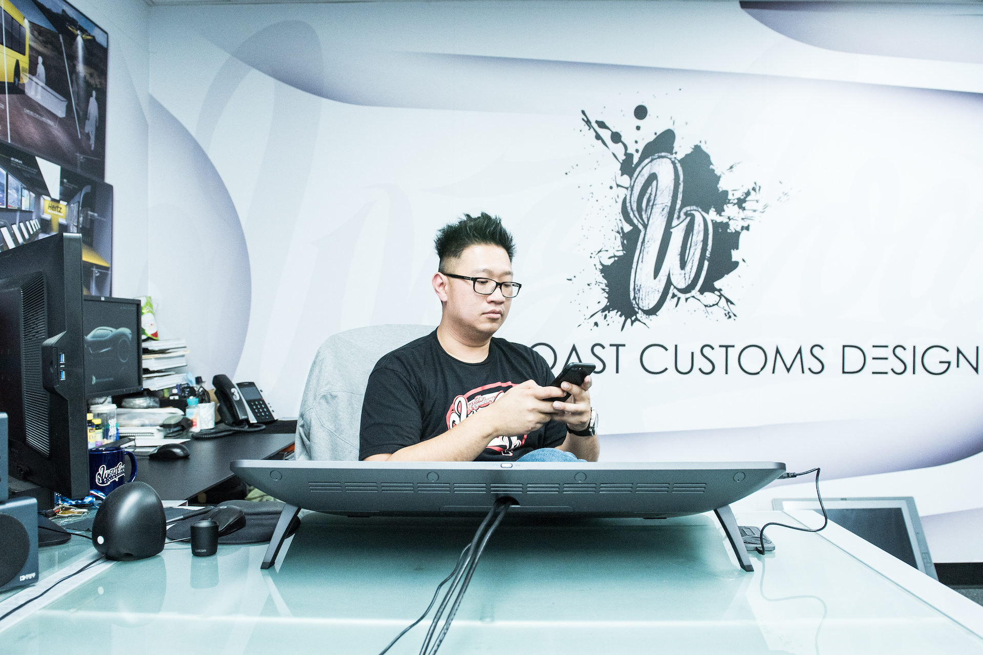 Musa in his office at West Coast Customs.