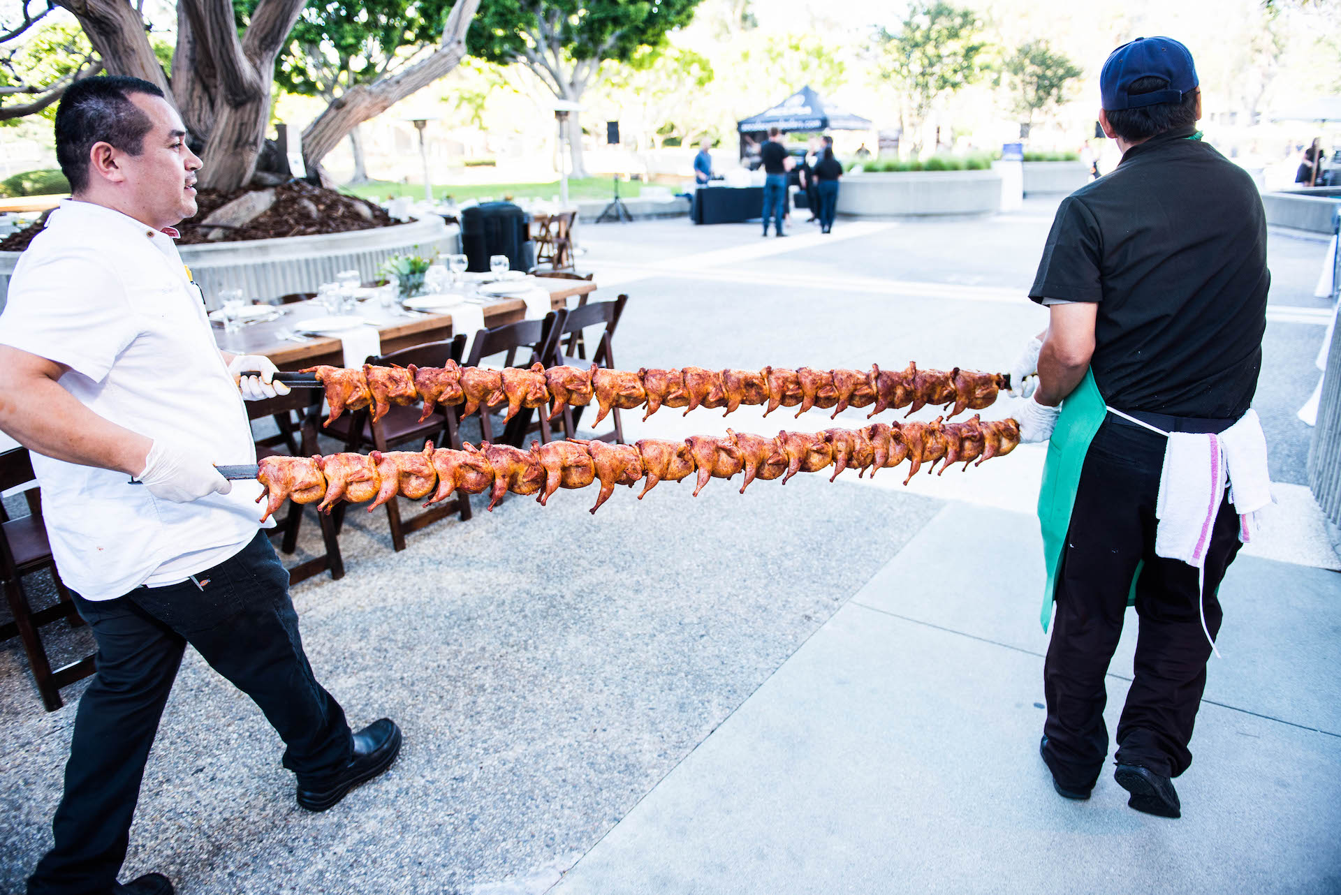 A chicken rack being carried across LA Food Bowl's first Beast Feast.