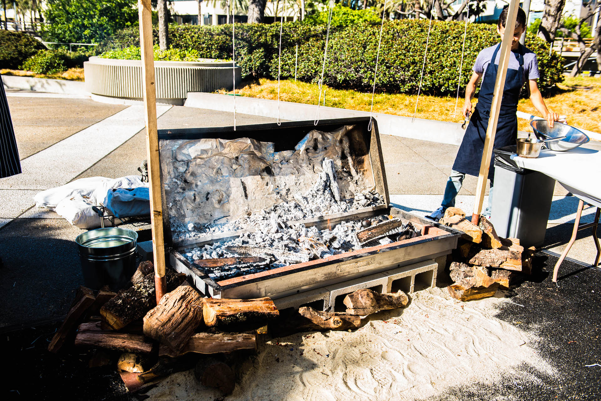 April's temporary barbecue pit is a serious affair.