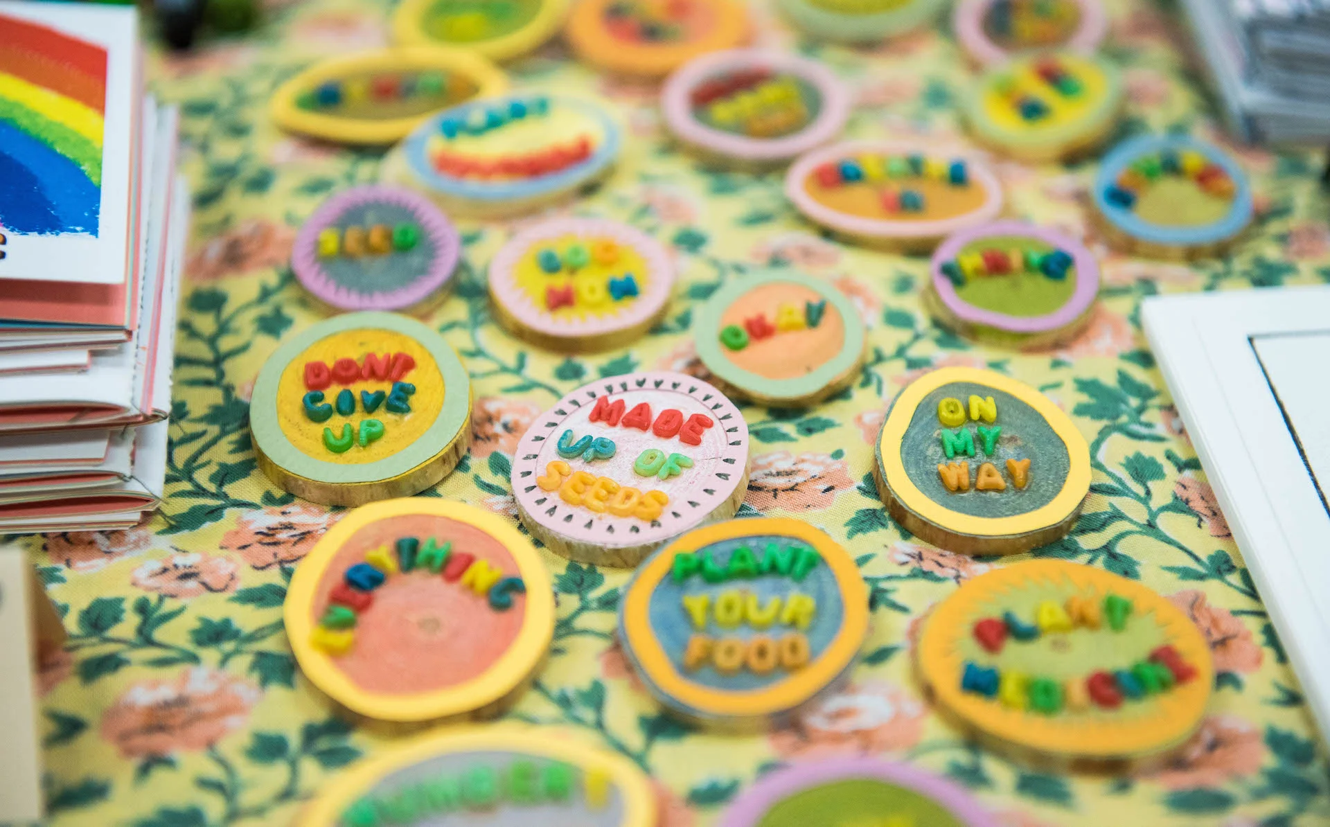 Zine fest is a great time to showcase Tony's handmade brooches which feature unique phrases.