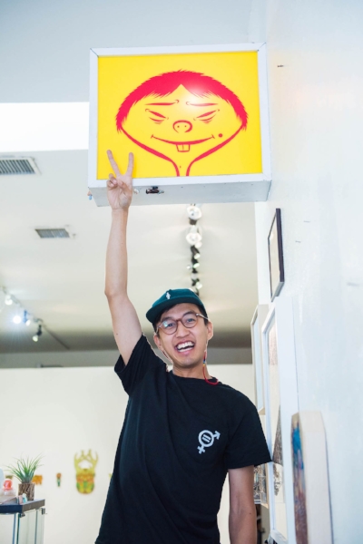 Tony with a Barry McGee sign at Giant Robot 2.
