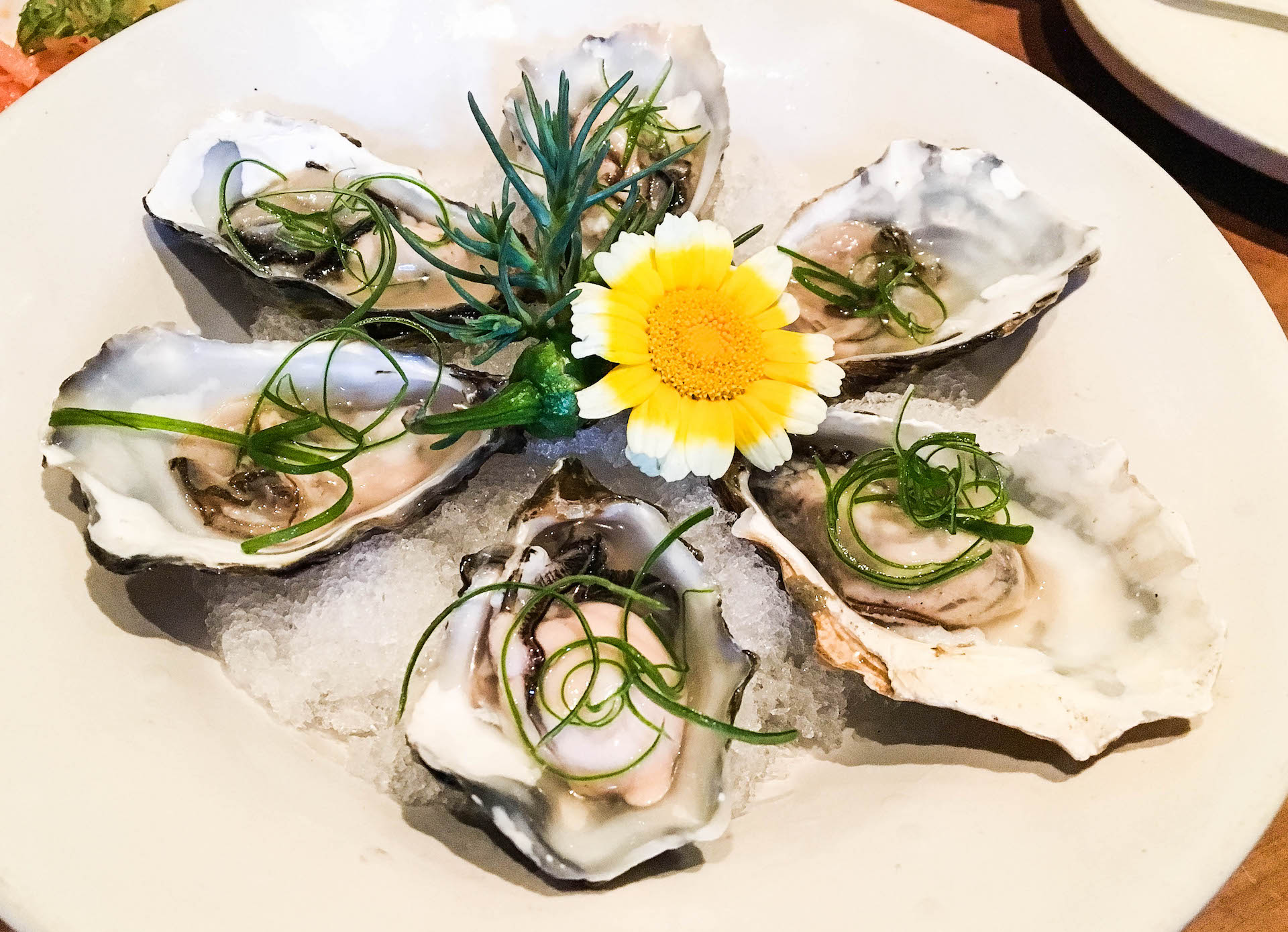 Oysters with dashi, scallions, and lime. 