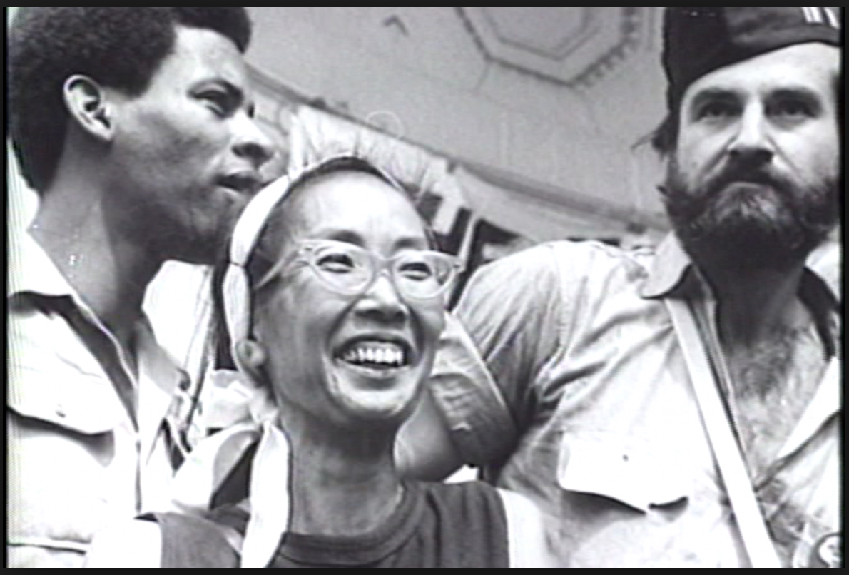 Smiling Japanese American activist, Yuri Kochiyama. Courtesy of Renee Tajima-Peña.