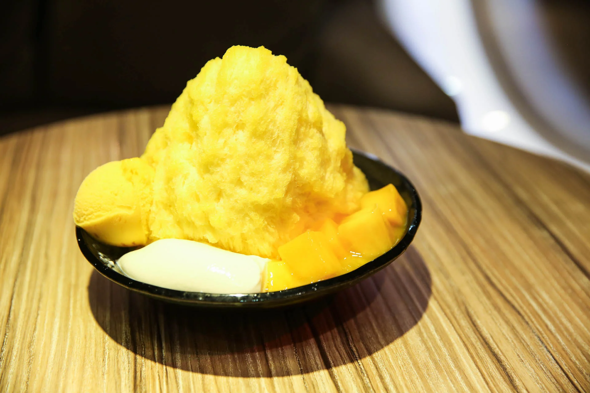 The famed Mango Sweet Cotton Ice, served with fresh mangoes, pudding, and mango ice cream.