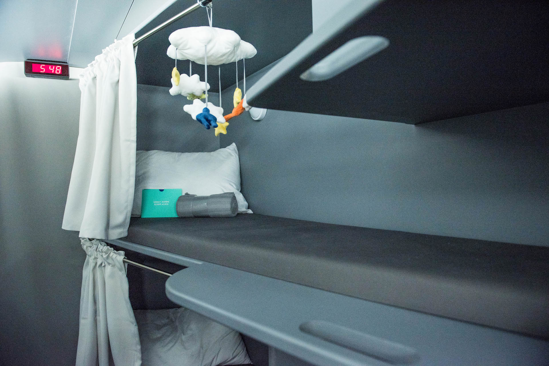 Tucked in the back of the plane there are bunk beds. Yup, you can finally sleep in a real bed during a long haul flight.