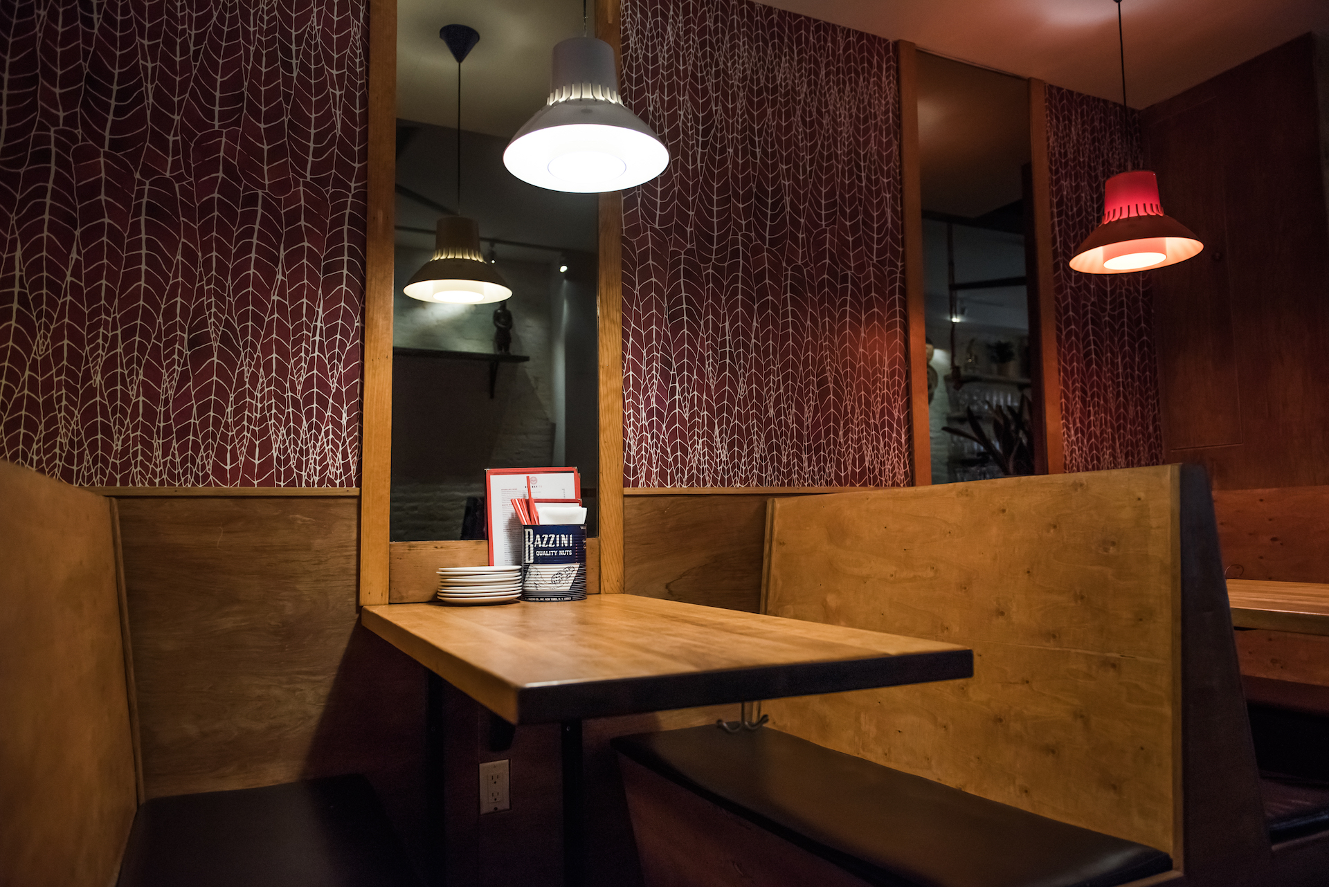 The Toon leaves that inspired Jonathan adorn the walls of Nom Wah Tu. 
