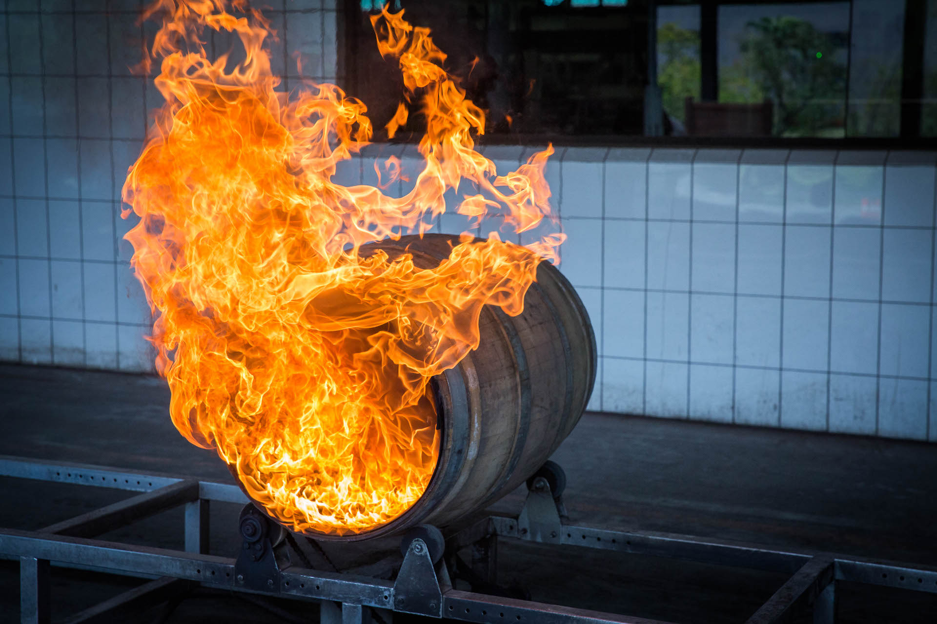 Wine barrels were charred to develop a deep smoky, cherry, and grape flavor.