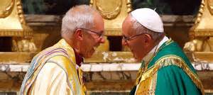 Pope Francis and Archbishop of Canterbury Justin Welby exchange a sign of peace during Vespers at the Monastery of San Gregorio al Celio in Rome, October 5, 2016.