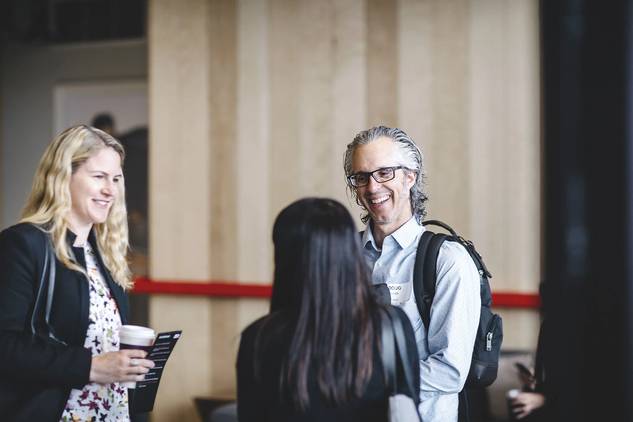 Attendees converse during the 3% Mini-Conference at the Steelhead headquarters in Los Angeles on April 26th, 2018.