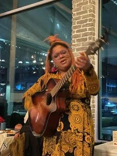 Elias Foundation guitar playing.jpg