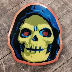 Deluxe Skeletor spray painted head on cut wood. — EPYON5
