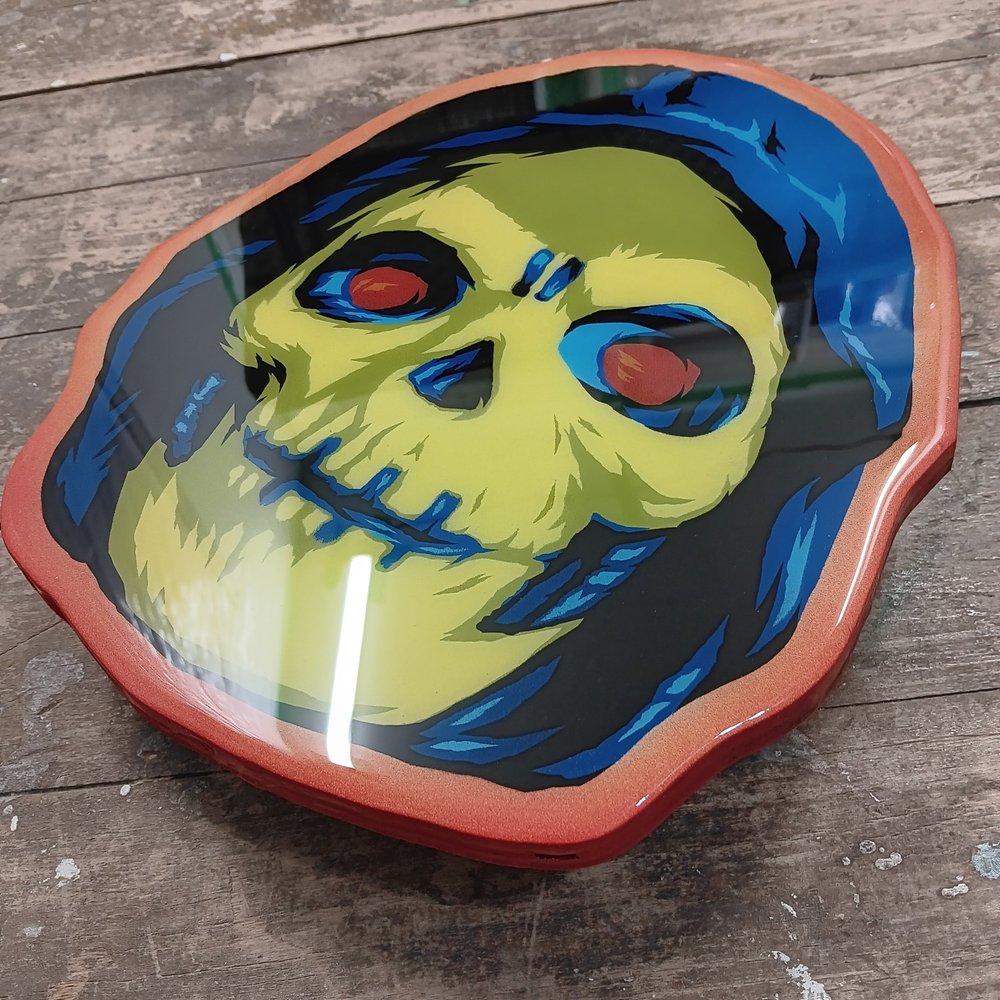 Deluxe Skeletor spray painted head on cut wood. — EPYON5