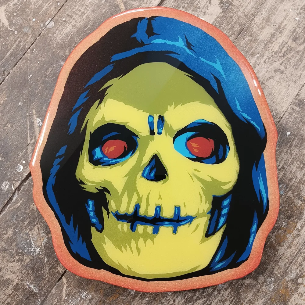 Skeletor spray painted head on cut wood. — EPYON5
