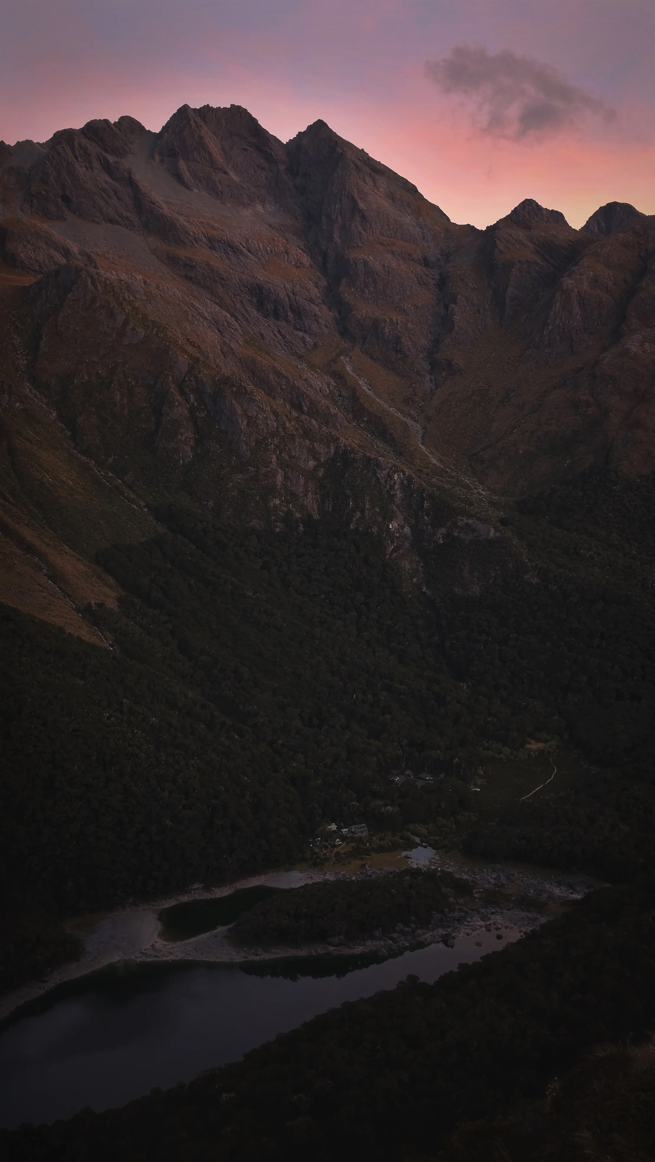 Our campsite & "hut" far below as the sky darkens.