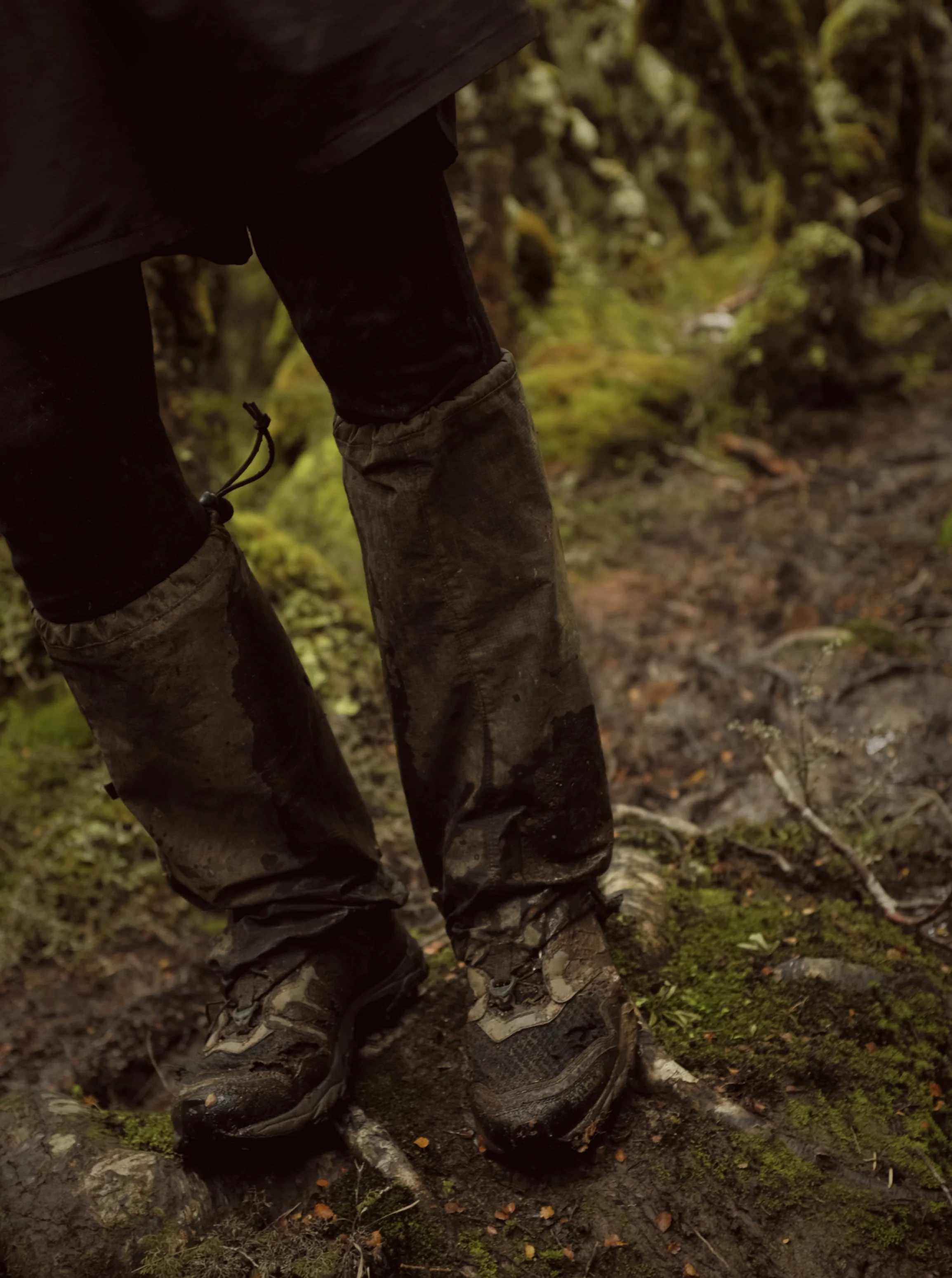 Ripped, muddy, and wet.