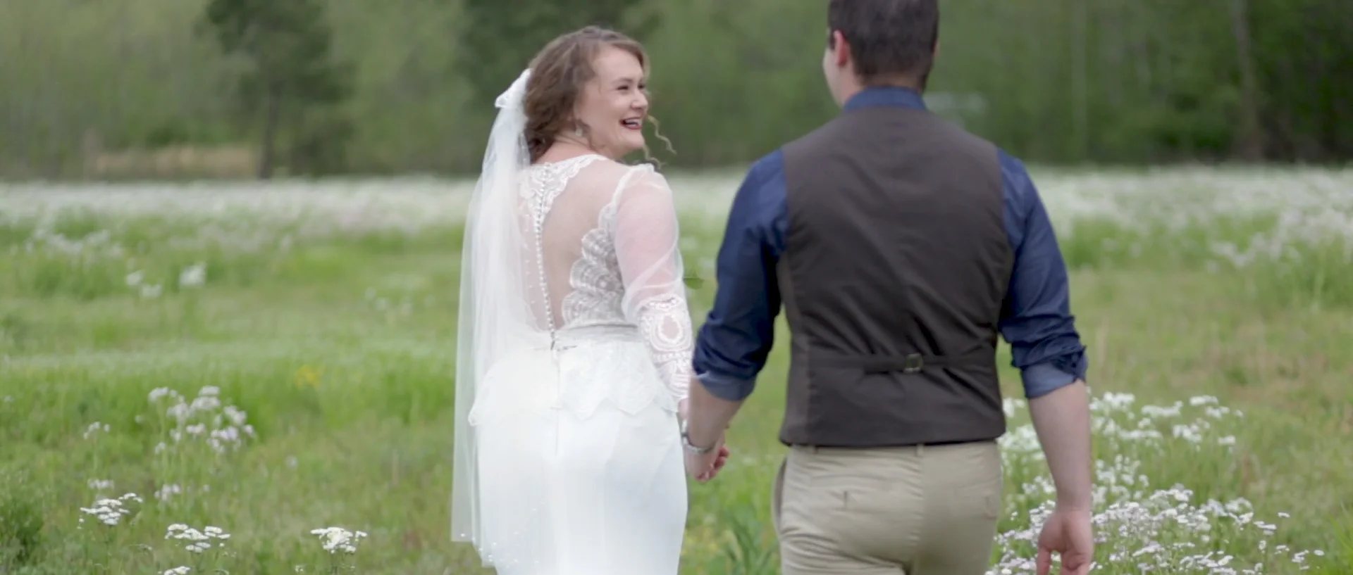 josee-corey-wedding-dress-photos-in-field-amavi-films-memphis-wedding-videographer.jpg
