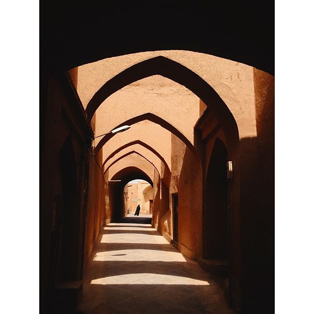 Do people define places or the other way around? #moments #iphonography #ontheroad #wanderlust #architecturelovers #shadowplay #yazd #travel #iran #backpacking #rnifilms