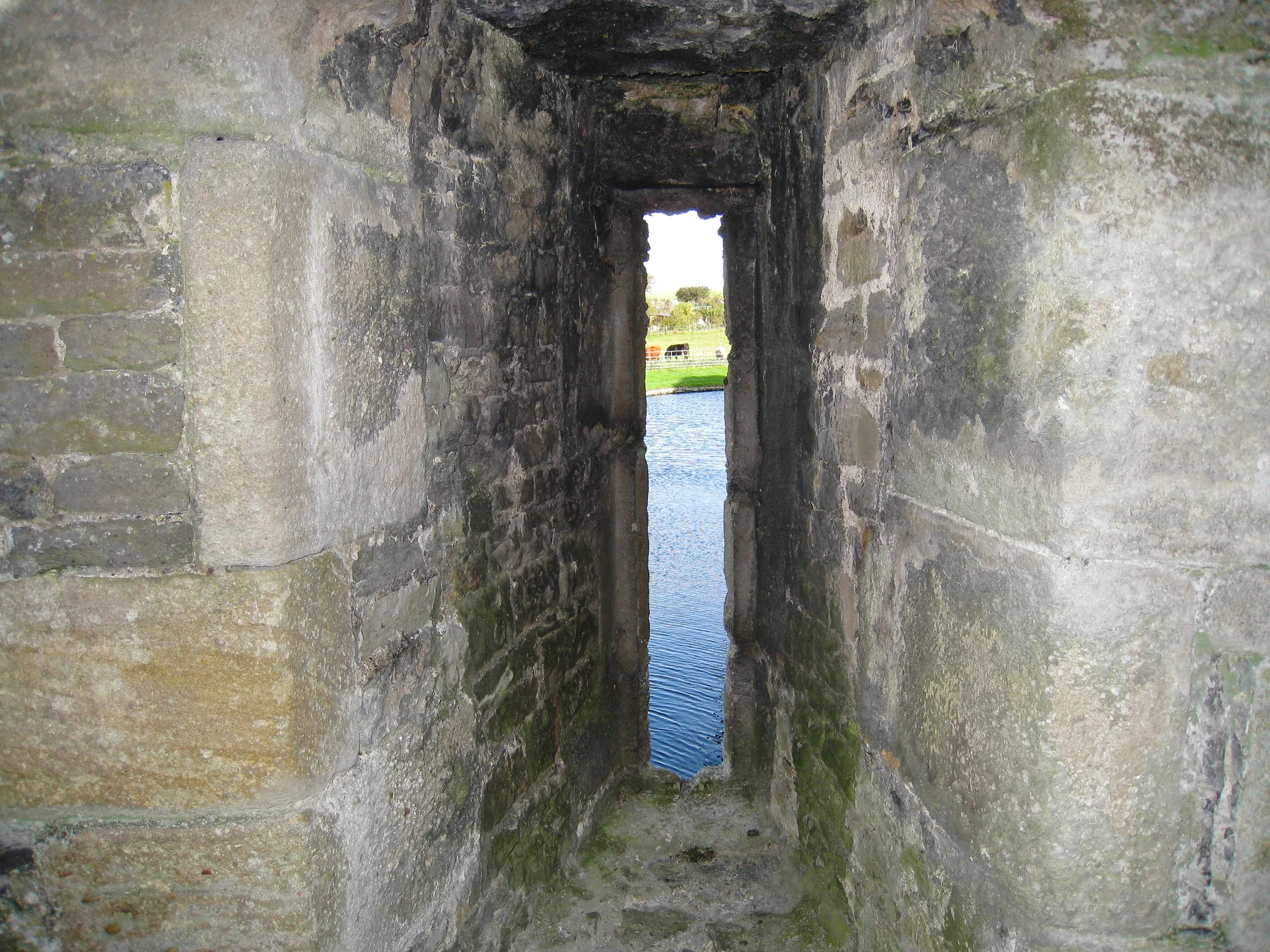  Wales--Beaumaris--Castle arrow slip (port) looking over moat 