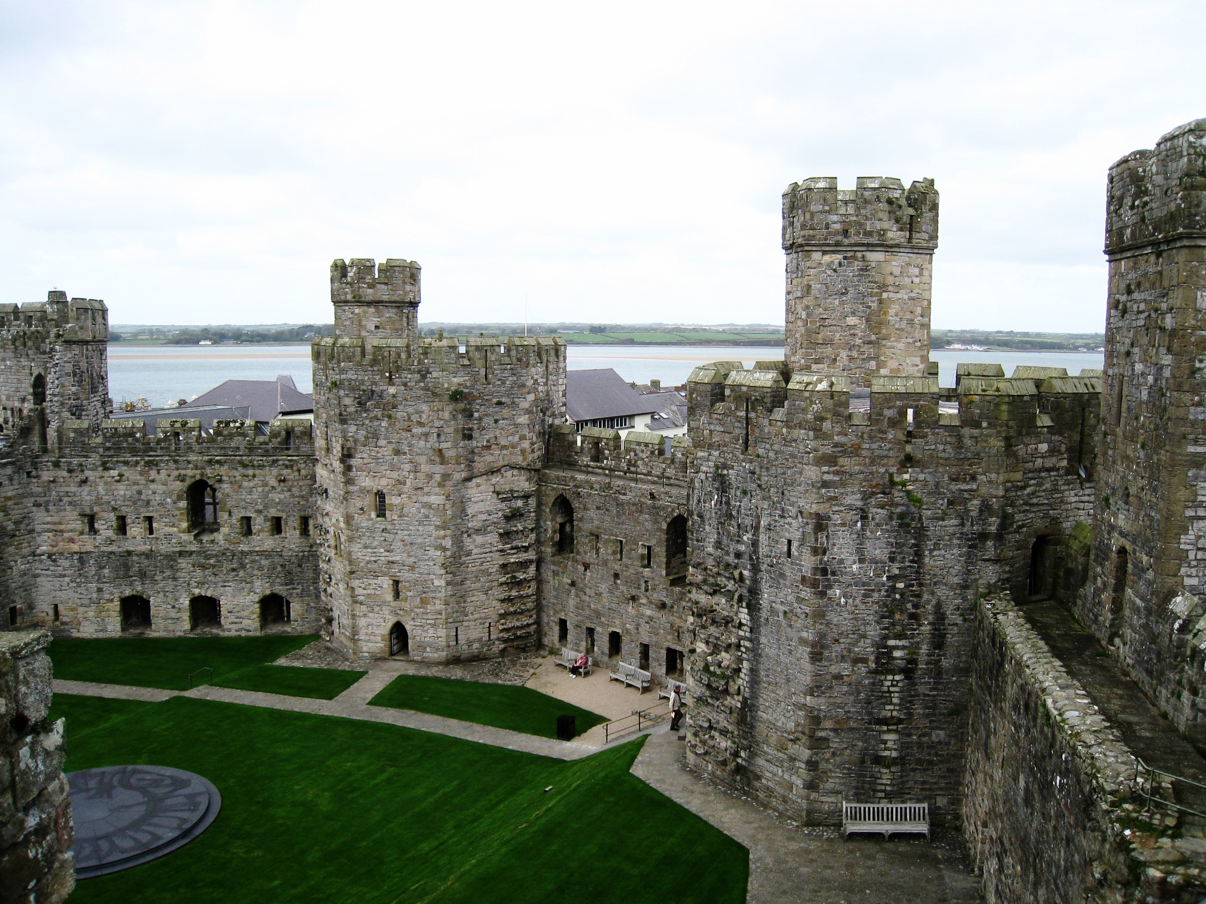  Caernarvon--Castle interior with Anglsee behind 