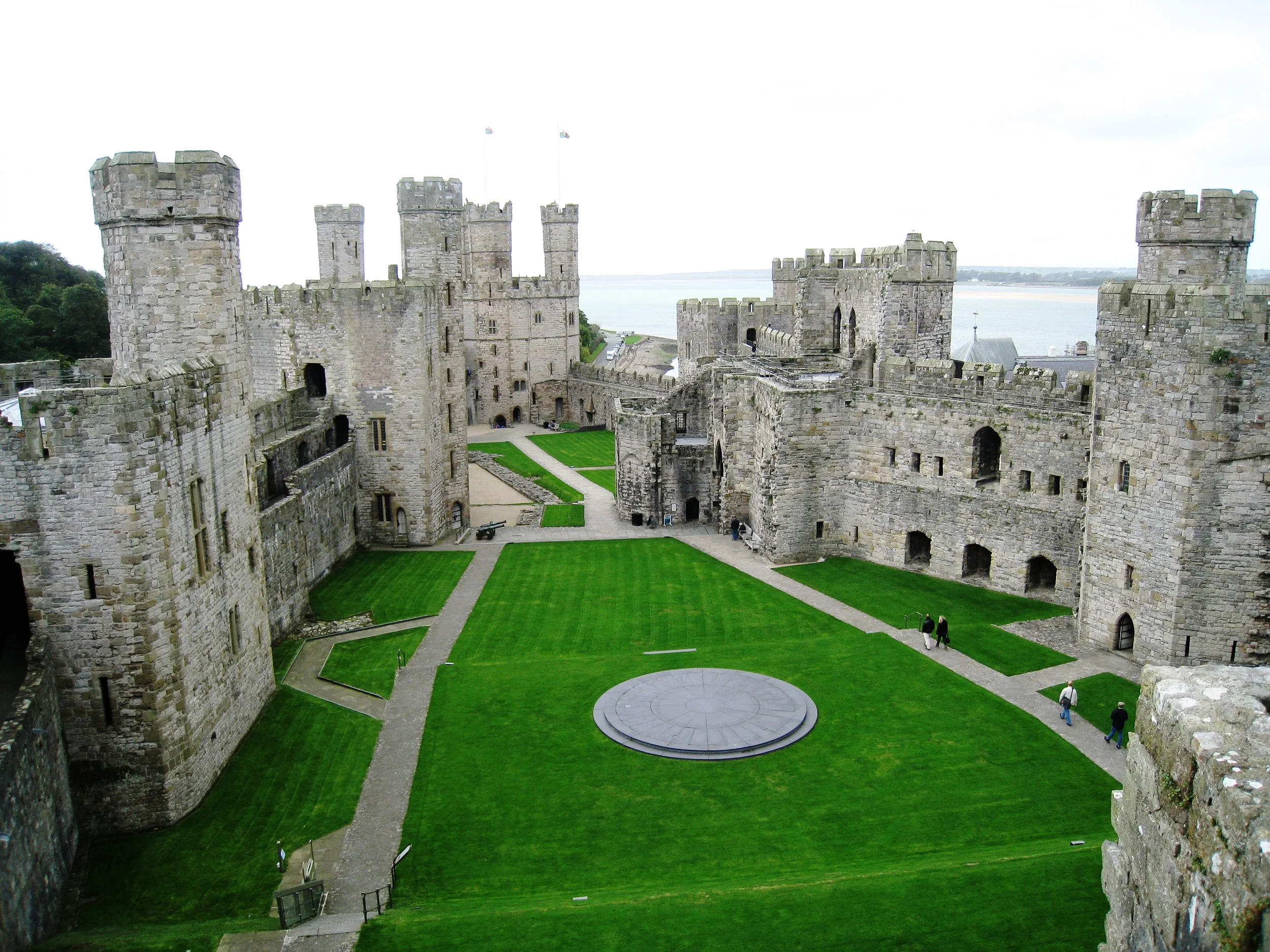  Caernarvon--Castle interior with Anglsee behind 