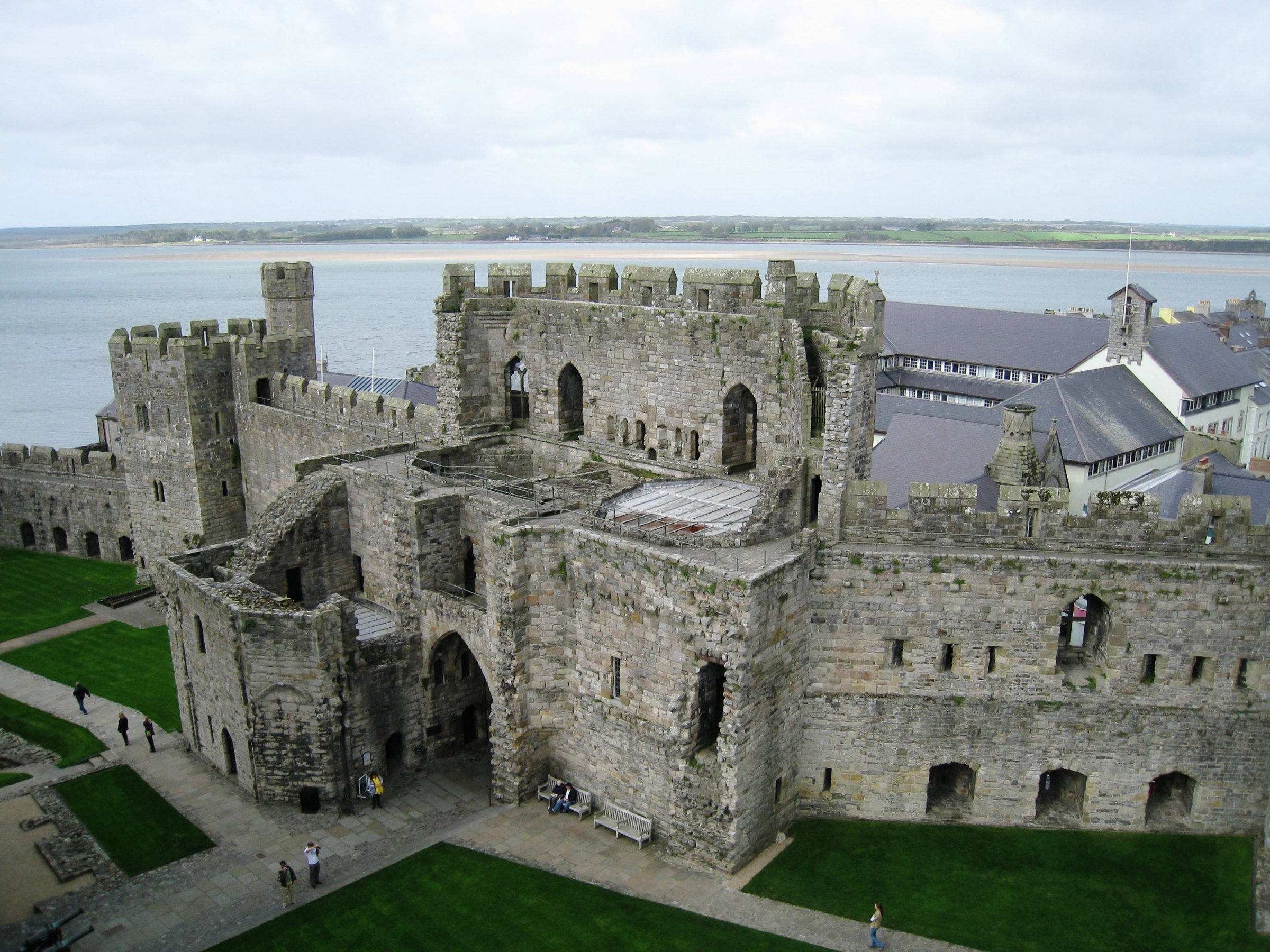 Caernarvon--Castle interior with Anglsee behind 