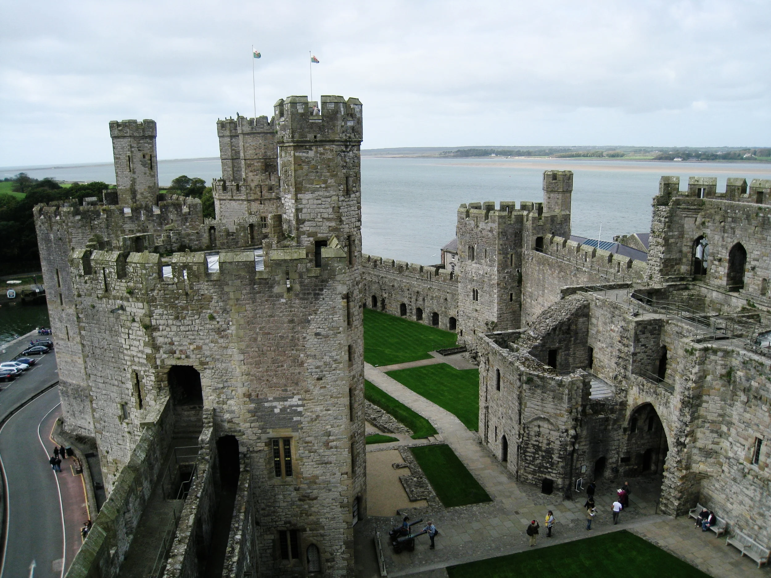  Caernarvon--Castle interior with Anglsee behind 
