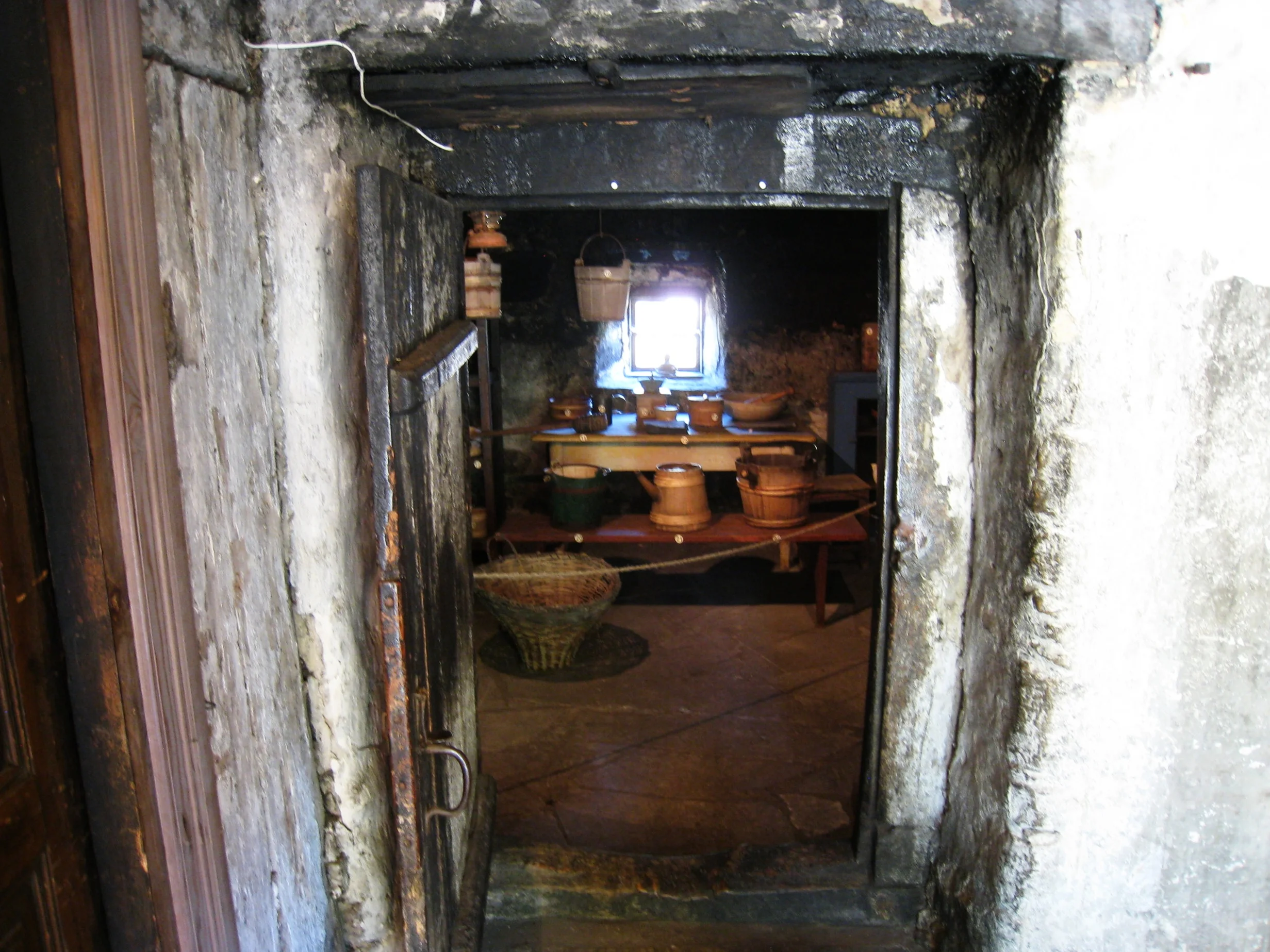  Saaremaa--Viki--Mihkli Farm Museum--Preserved farm--Main house--Smoke and cooking room (note charred doorframe) 