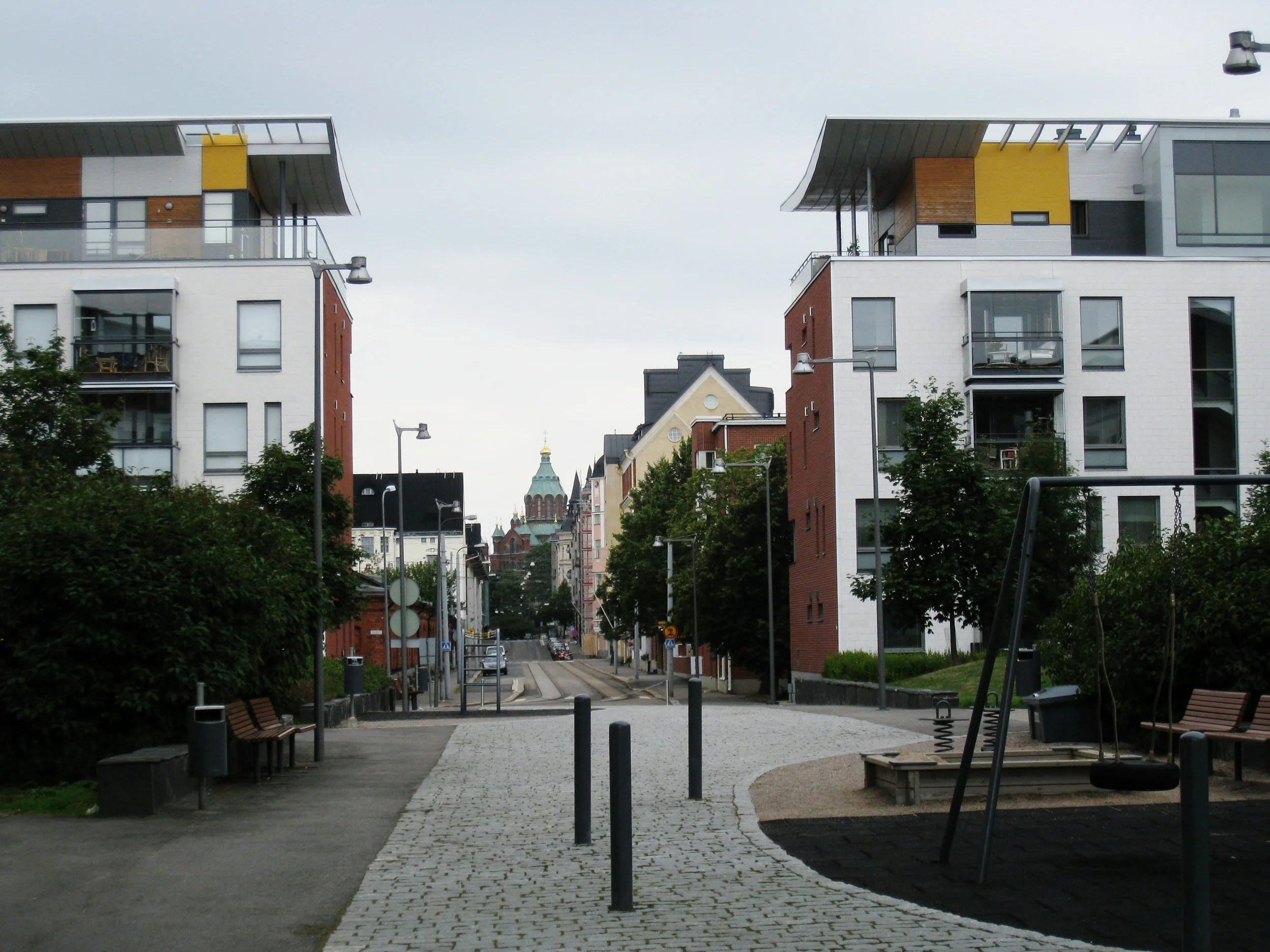  Helsinki--Katajanokka District--New apartments with Uspenski Cathedral behind 