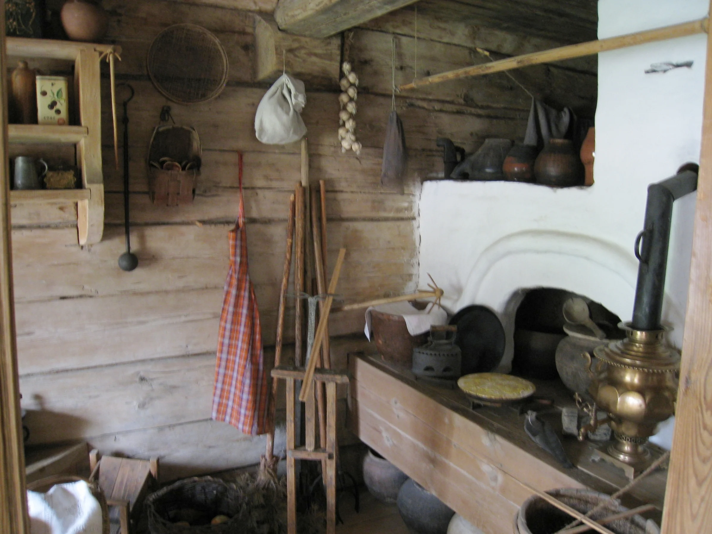  Novgorod--Outdoor Museum--Typical early peasant house--Kitchen and stove 